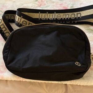 lululemon athletica Black Belt Bag with Gold-Trim Logo Strap